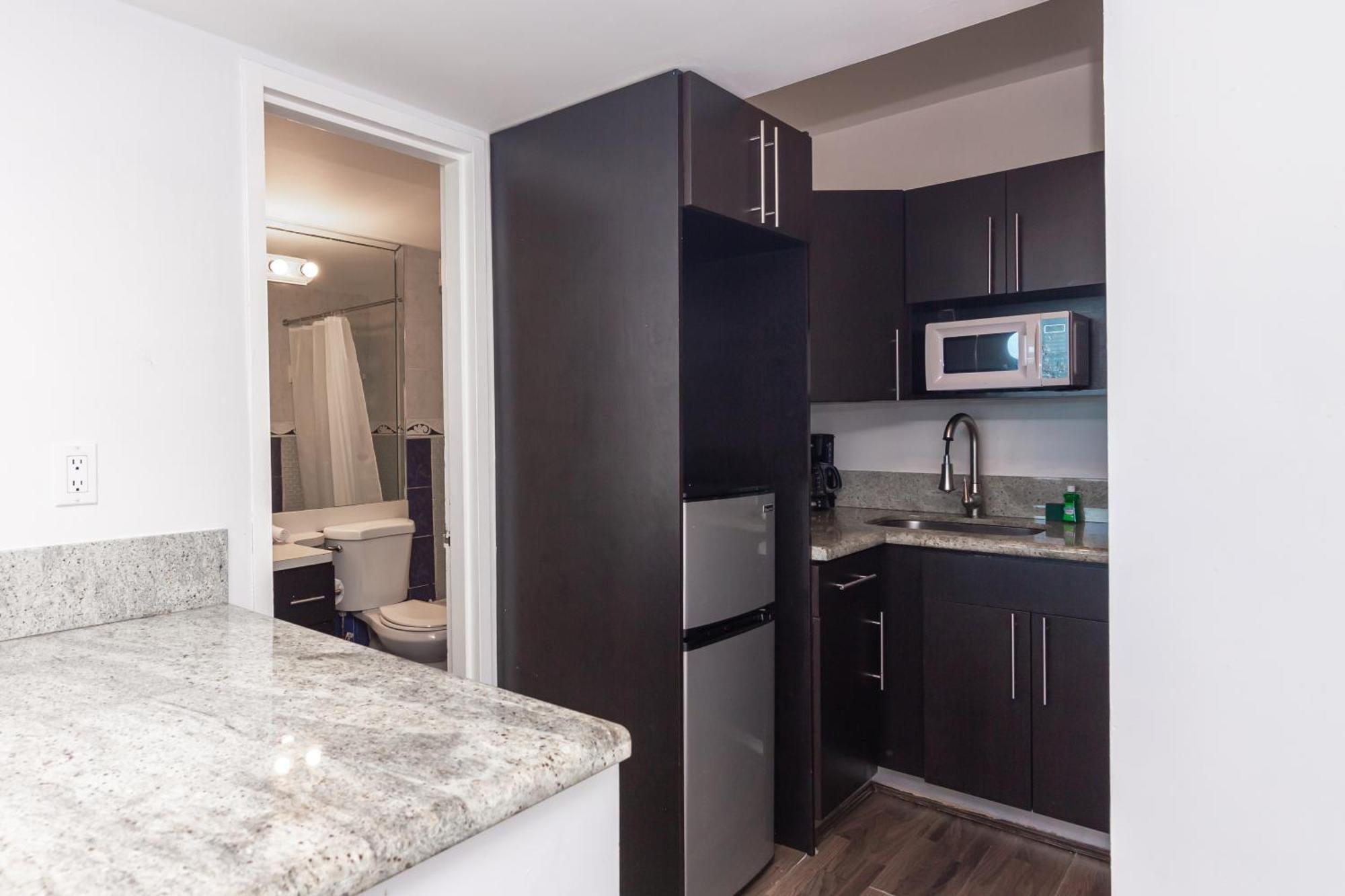 Girasole Rentals Suites Маями Бийч Стая снимка