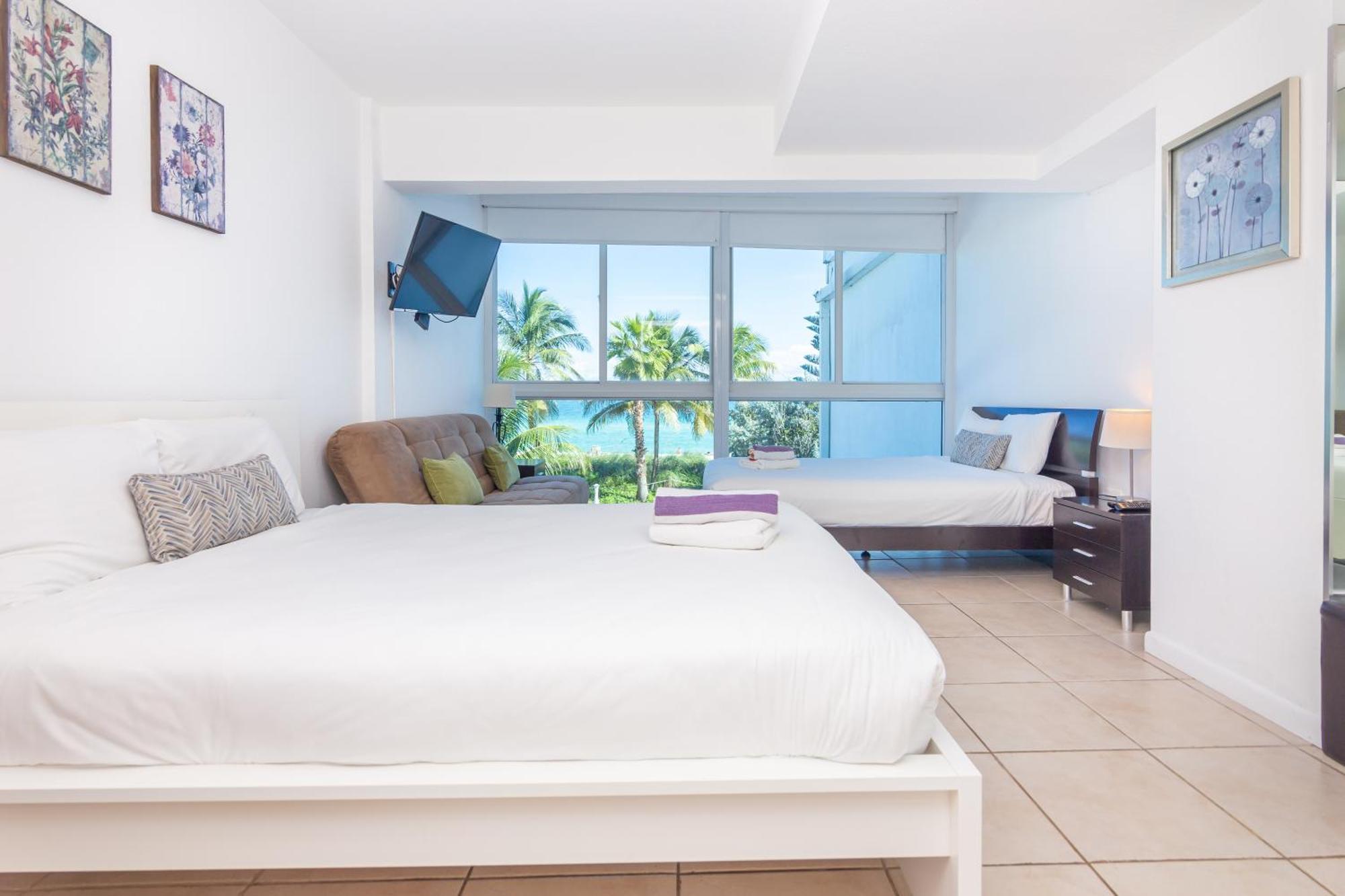 Girasole Rentals Suites Маями Бийч Стая снимка